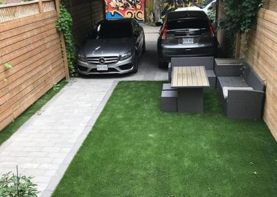 Artificial turf by the driveway